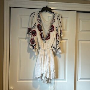 Flirty White Dress with flared sleeves